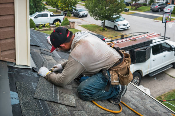Professional Roofing technician working in East Waterford, PA
